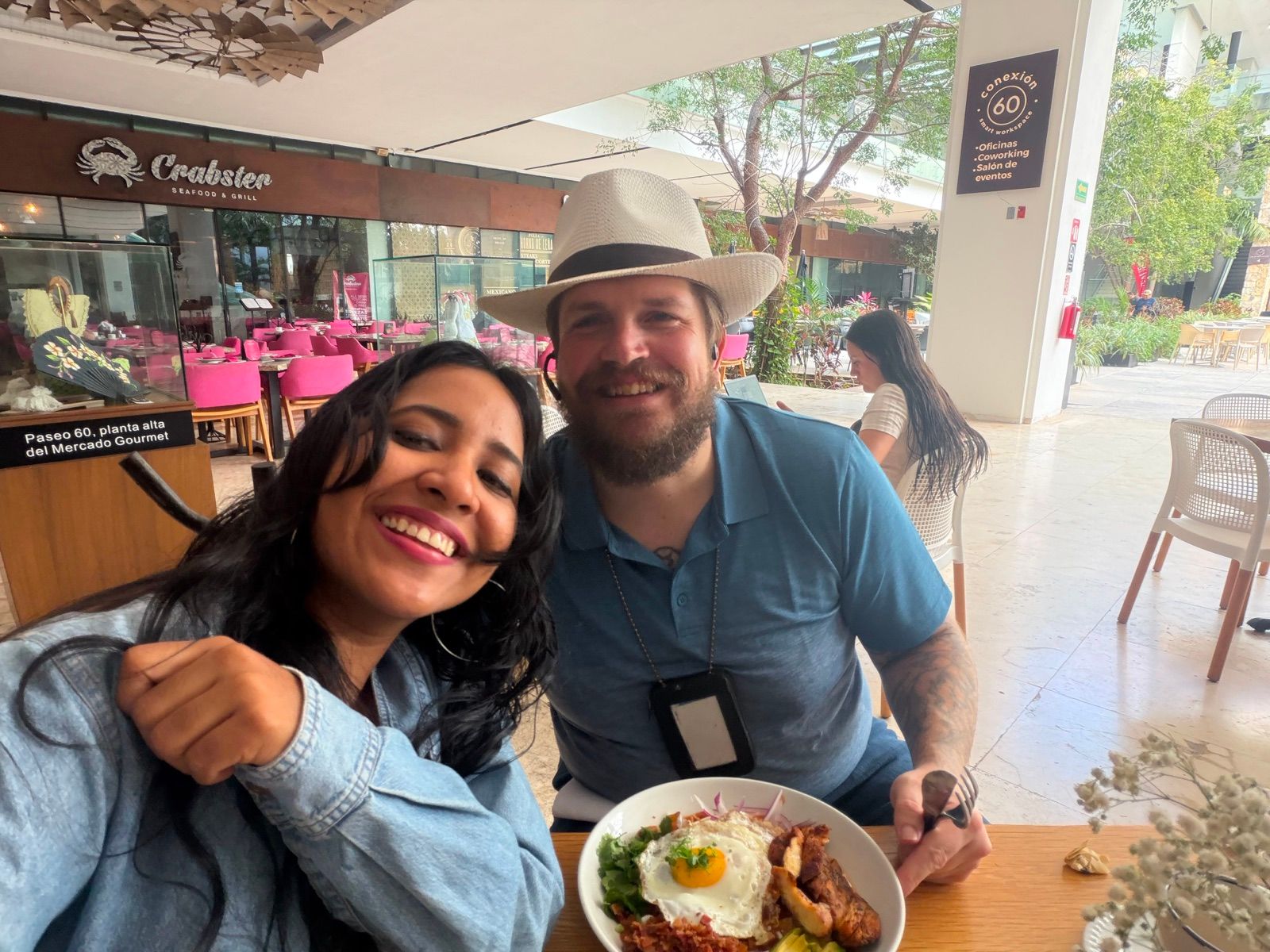 Sam and Blanca, the American–Mexican couple behind MexPath, at a café in Mérida
